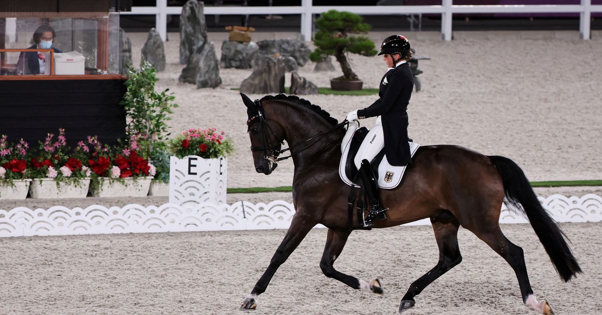 Tokyo 2020 Olympics - Equestrian - Dressage - Individual - Grand Prix - Day 2 - Groups D/E/F - Equestrian Park - Tokyo, Japan - July 25, 2021. Dorothee Schneider of Germany on her horse Showtime FRH competes. REUTERS/Alkis Konstantinidis