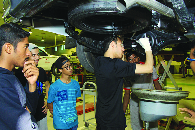 A mechanics workshop being held for students at the Qatar Scientific Club.