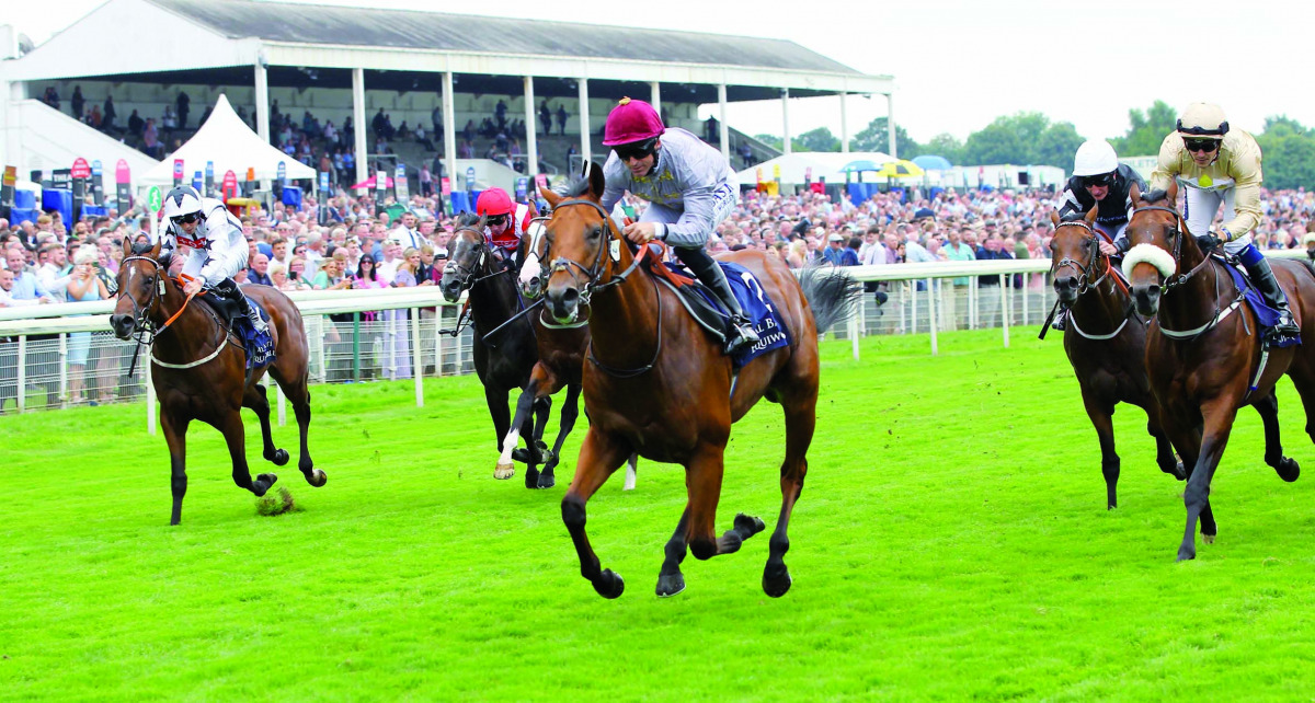 Pat Dobbs guides Lusail to Gimcrack Stakes win at York Racecource, yesterday.