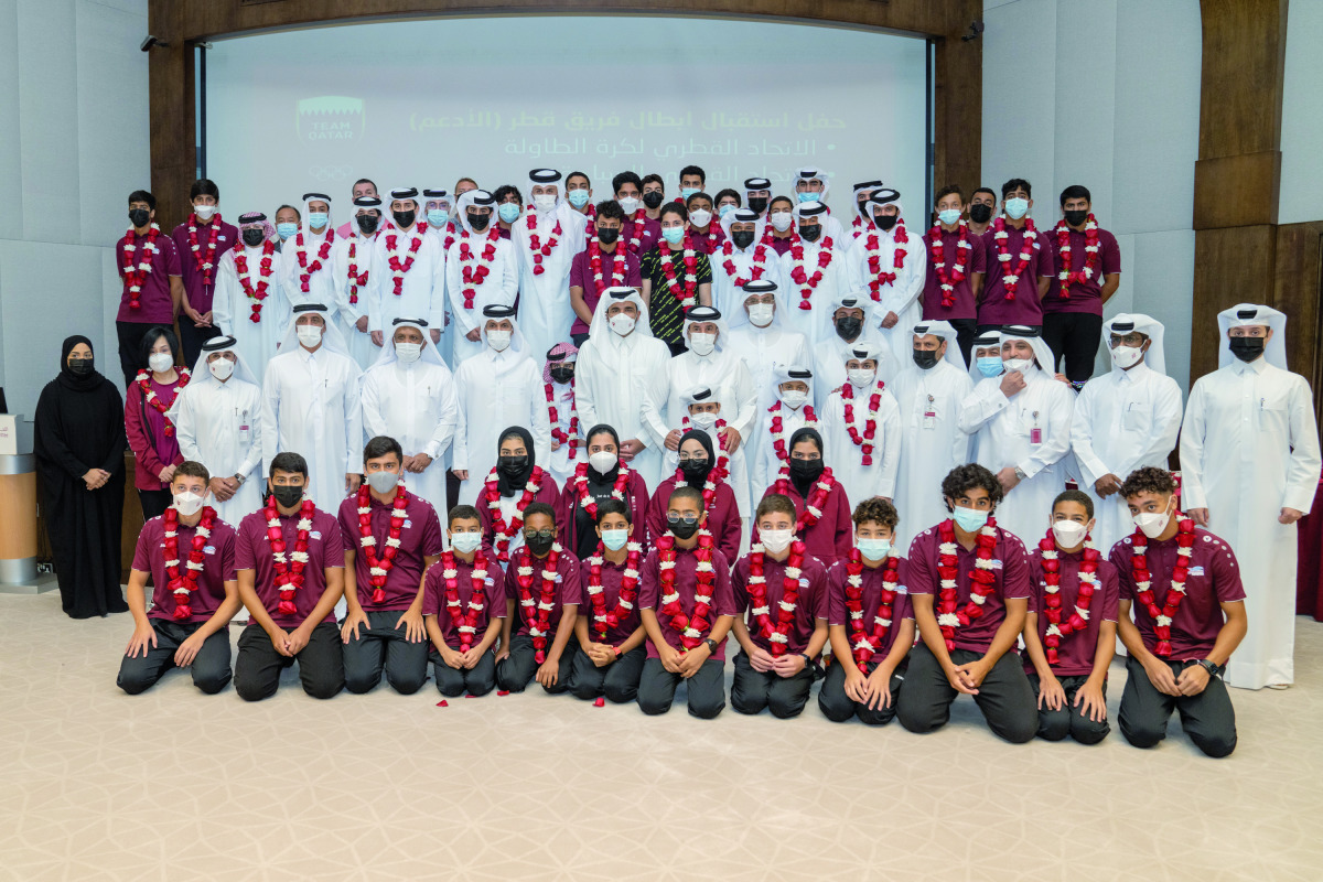 The President of the Qatar Olympic Committee (QOC), H E Sheikh Joaan bin Hamad Al Thani, posing for a photograph with medal winners at the recently concluded Arab Table Tennis Championships and 28th GCC Aquatics Championships