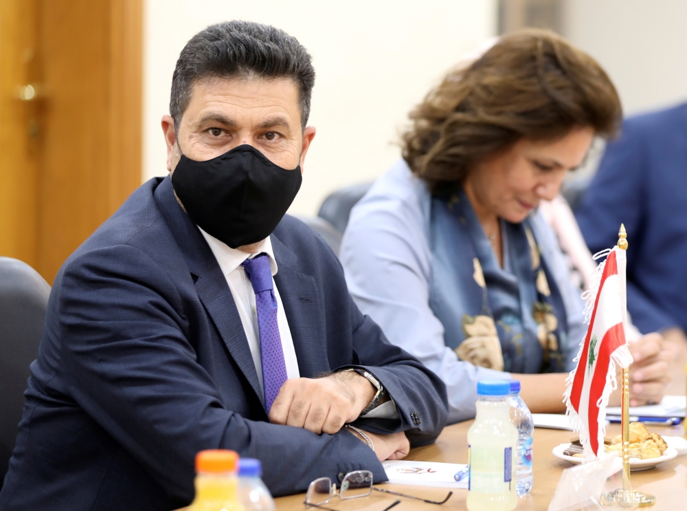 FILE PHOTO: Lebanon's Energy Minister Raymond Ghajar, attends a meeting with Jordan's Minister of Energy and Mineral Resources Hala Zawati, Syria's Minister of Oil and Mineral Resources Bassam Tohme (not seen) and Egypt's Minister of Petroleum and Mineral