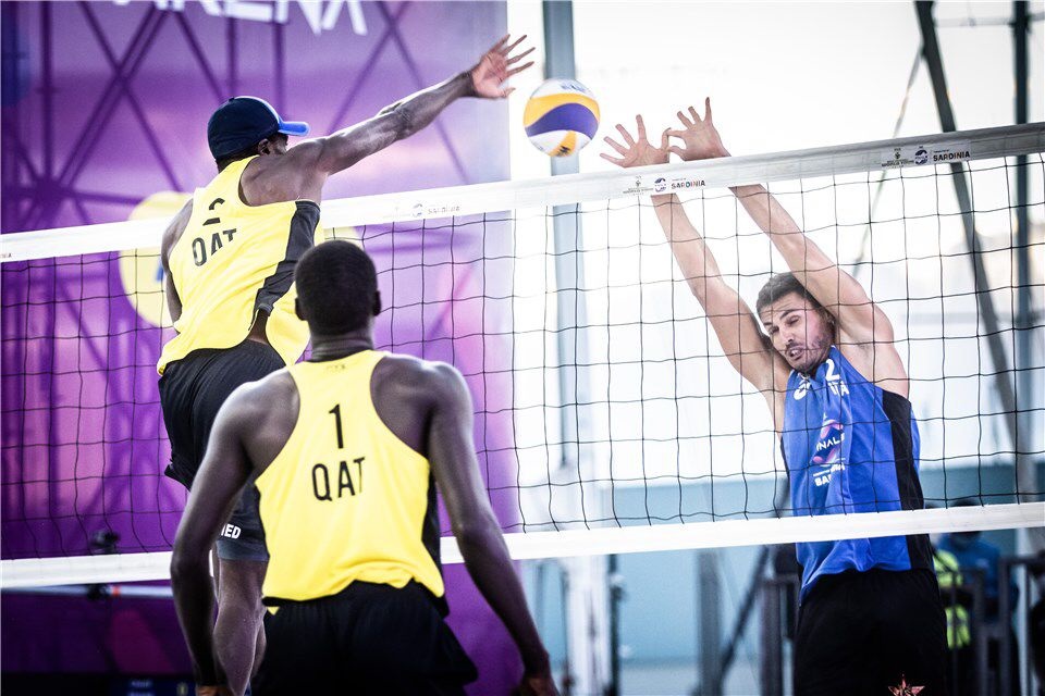 Qatar’s Cherif Younousse and Ahmed Tijan (left) in action yesterday.