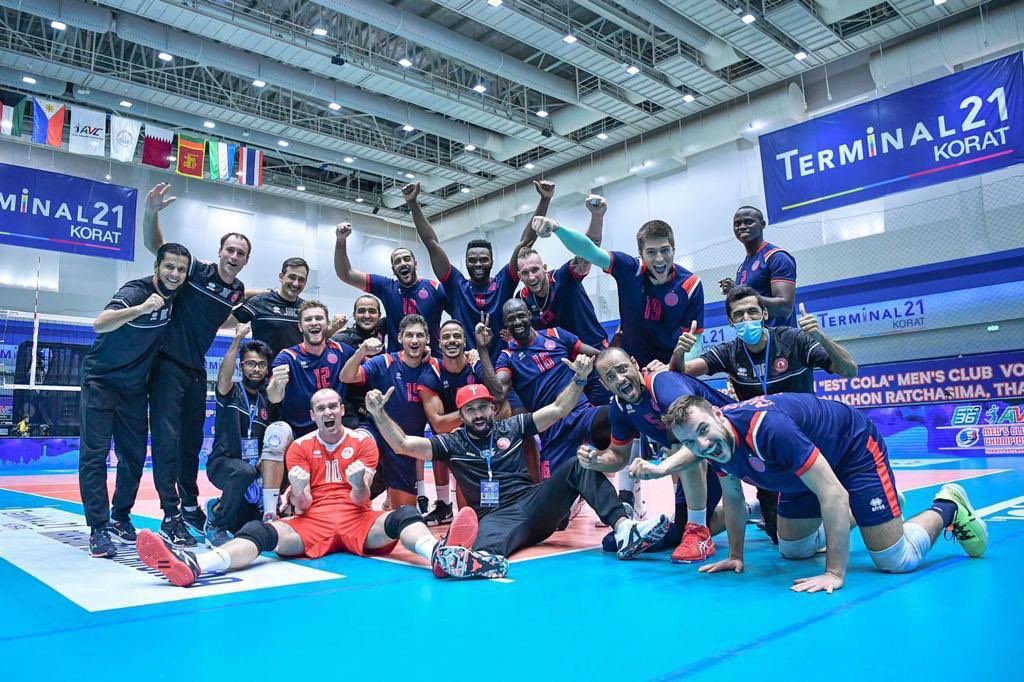 Al Arabi players and officials celebrate after qualifying for the final of the AVC Senior Men's Club Volleyball Championship.  