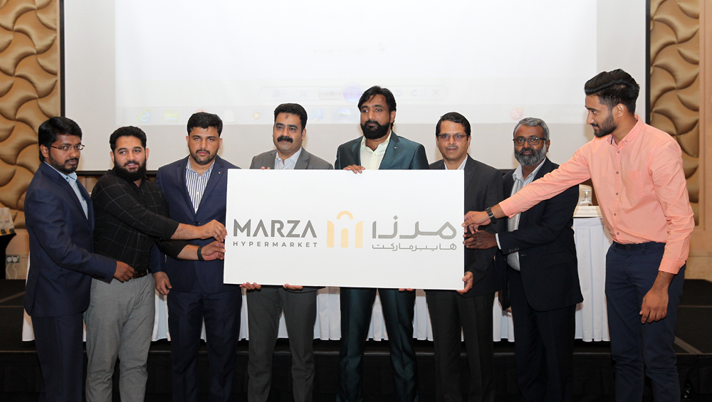 Managing Director of Al Raheeb International Group Jafar Kandoth (fourth right) unveiling the logo of Marza Hypermarket during a media briefing, in Doha, yesterday. Pic: Salim Matramkot/The Peninsula