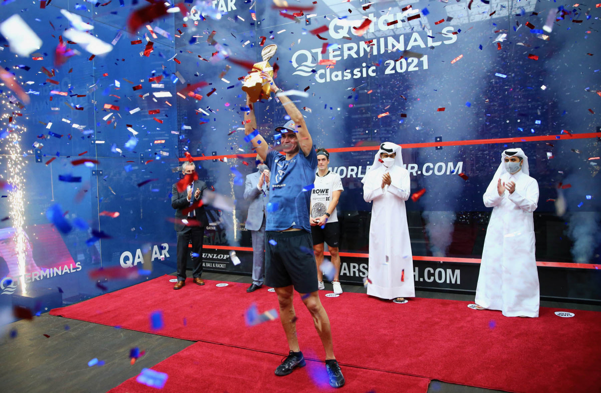 Peru’s Diego Elias lifts the Qatar QTerminals Classic trophy after winning the final. Qatar Tennis, Squash and Badminton Federation President Nasser bin Ghanim Al Khelaifi and QTSBF Secretary-General Tareq Zainal are also present.