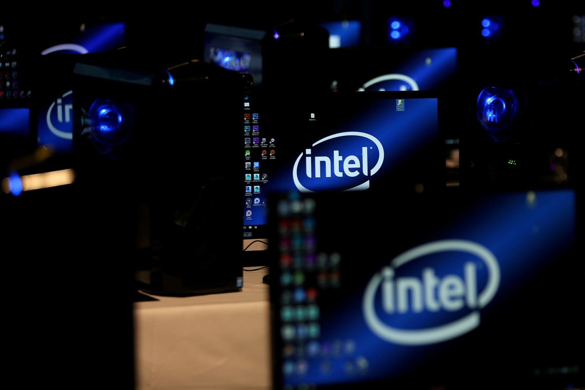 FILE PHOTO: The intel logo is displayed on computer screens at SIGGRAPH 2017 in Los Angeles, California, U.S. July 31, 2017. REUTERS/Mike Blake/File Photo