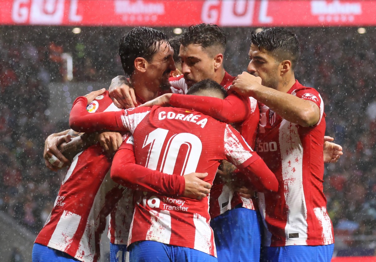 Atletico Madrid players celebrates their second goal, an pwn goal scored by Real Betis' German Pezzella REUTERS/Juan Medina
