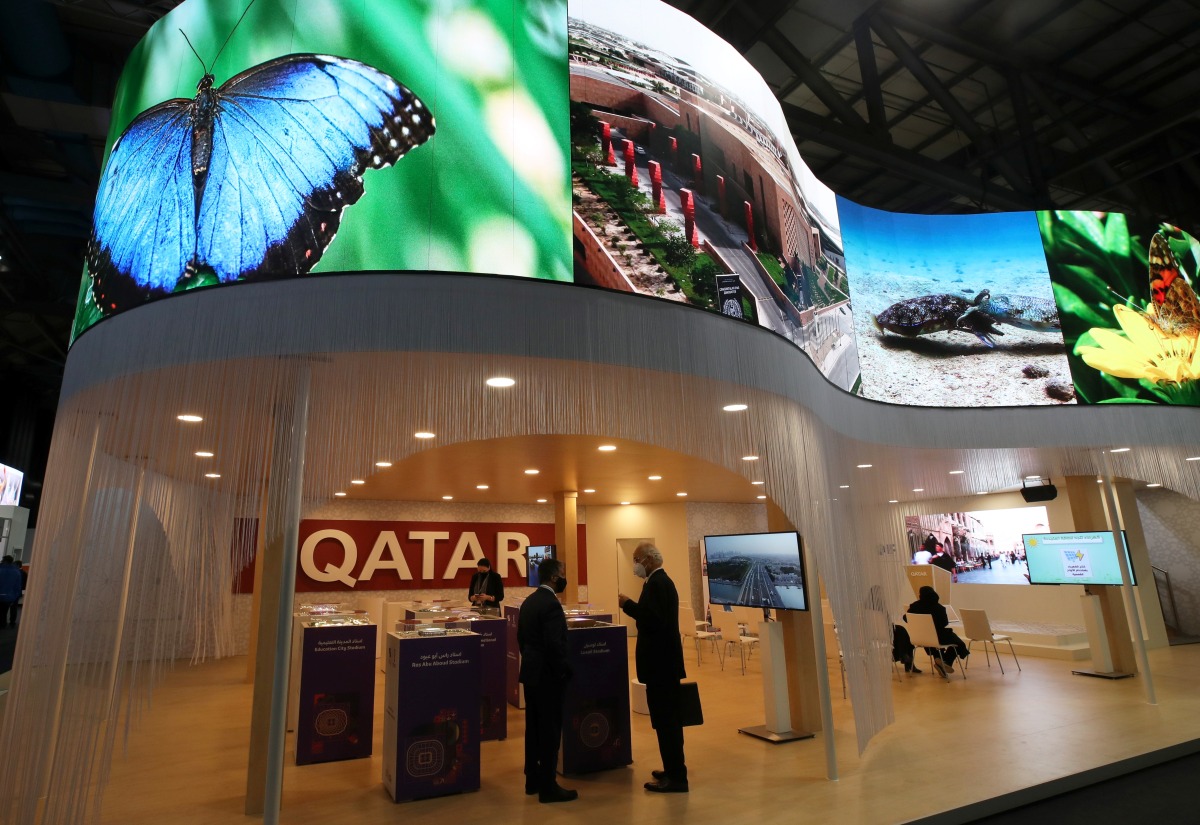 People visiting the Qatar pavilion during the UN Climate Change Conference (COP26) in Glasgow, Scotland, Britain, yesterday.