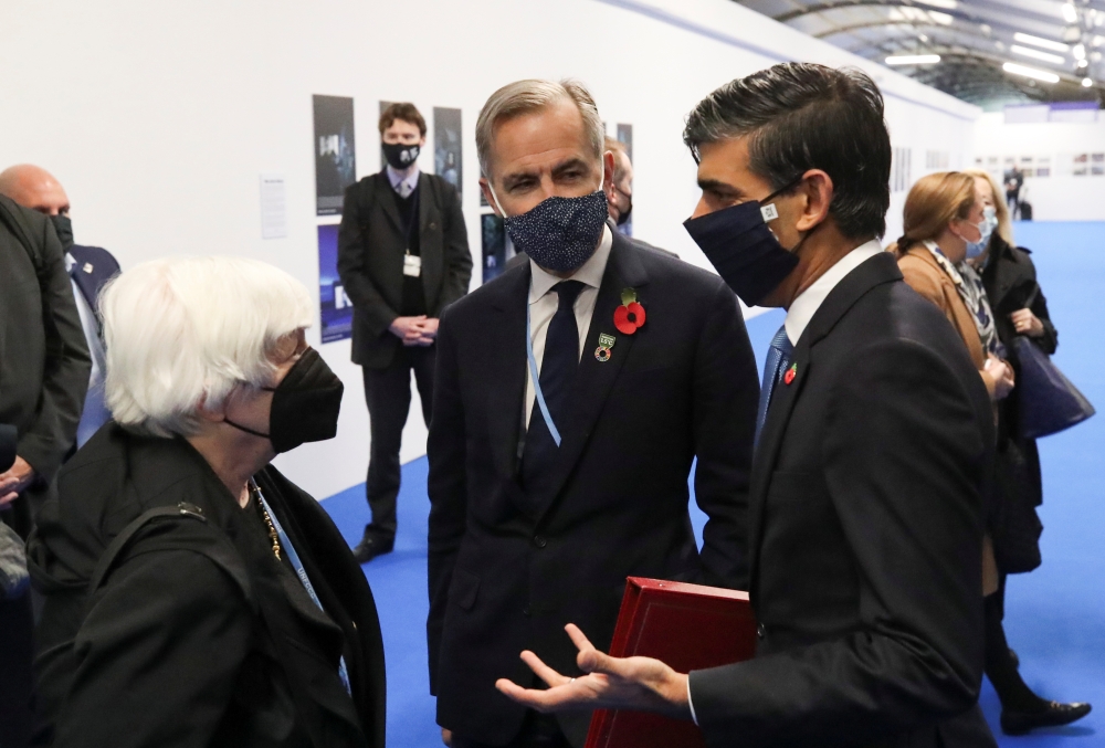 US Treasury Secretary Janet Yellen, former Bank of England Governor Mark Carney and Britain's Chancellor of the Exchequer Rishi Sunak arrive at the UN Climate Change Conference (COP26) in Glasgow, Scotland, Britain, November 3, 2021. Reuters/Yves Herman