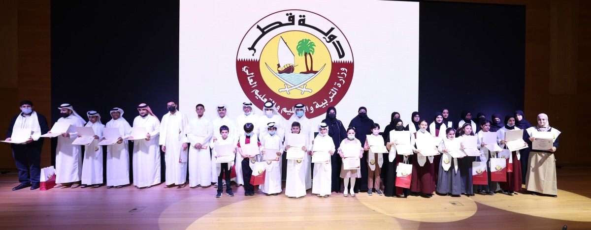 Assistant Undersecretary for Educational Affairs, Fawzia Al Khater and Assistant Undersecretary for Primate Education Affairs, Omar Al Nama with winners during the honouring ceremony.