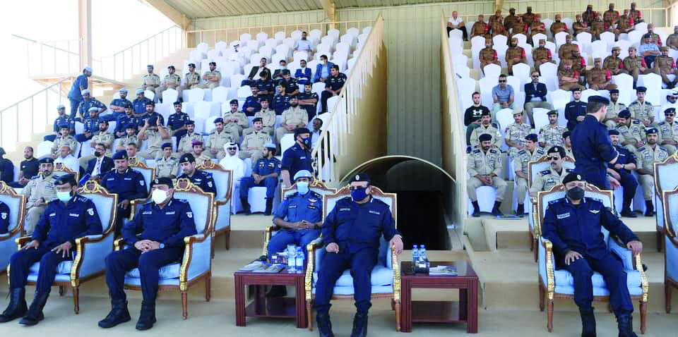 Officials and students during the graduation ceremony.
