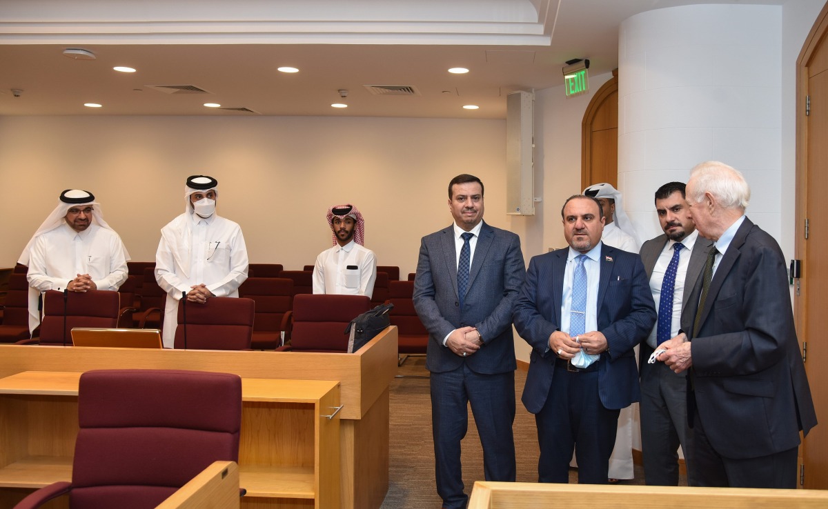 Iraq’s Minister of Justice H E Salar Abdul Sattar Muhammad with officials from Qatar International Court and Dispute Resolution Centre in Doha, yesterday. 