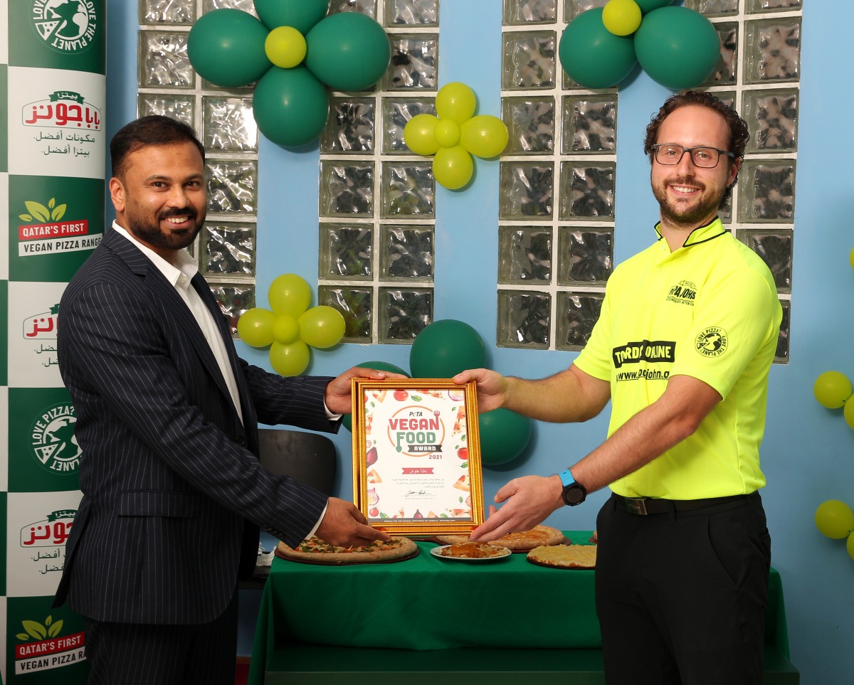 Adam Wilcock (right), R&D Director EMEA, Papa John’s International and Joseph Joseph, General Manager, Papa John’s Pizza Qatar during the launch of Vegan Pizza, the first of its kind in Qatar at a function held at the Papa John’s Ramada branch in Doha.  Pic: Salim Matramkot/The Peninsula