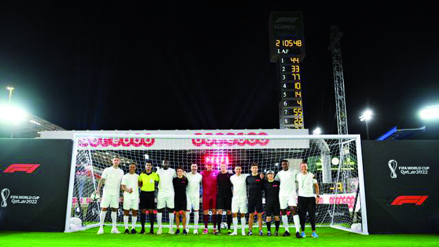 Football legends and Formula 1 drivers at the Losail Circuit Sports Club.