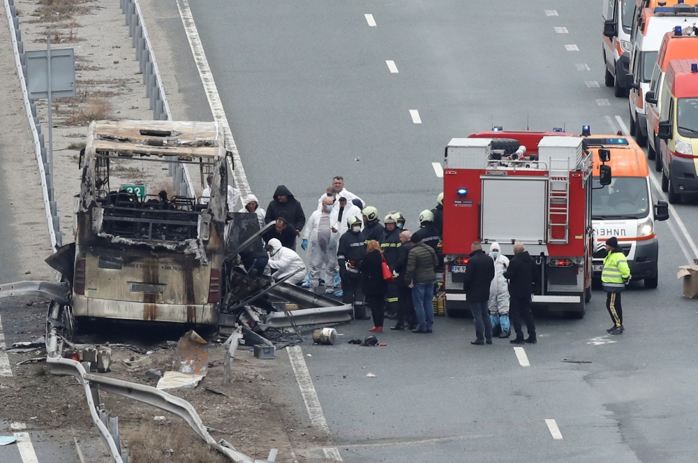 A view shows the site where a bus with North Macedonian plates caught fire on a highway, near the village of Bosnek, Bulgaria, November 23, 2021. REUTERS.