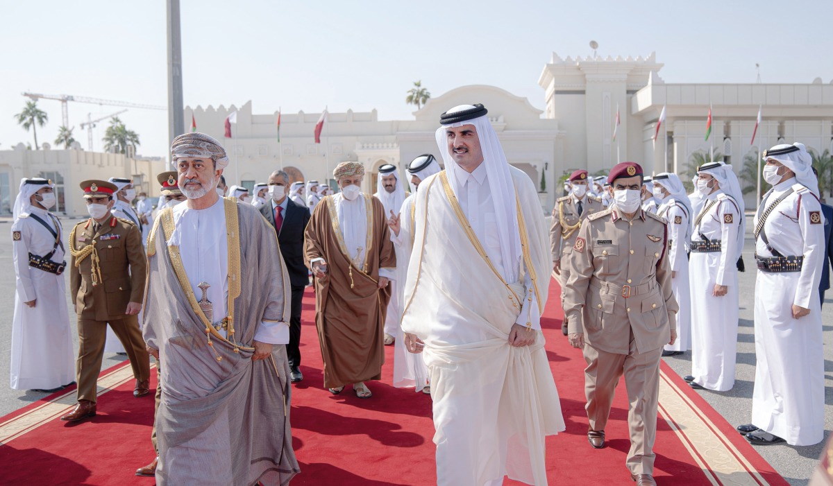 Amir H H Sheikh Tamim bin Hamad Al Thani seeing off H M Sultan Haitham bin Tariq at Doha International Airport, at the conclusion of H M the Sultan's two-day state visit to Qatar, yesterday.     