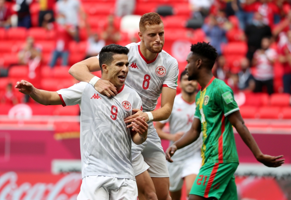 Tunisia's Firas Ben Larbi celebrates scoring their fourth goal with teammates REUTERS/Suhaib Salem 
