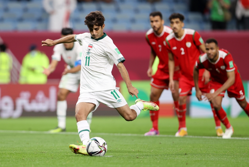  Iraqi Abdulkareem scores their first goal from the penalty spot.