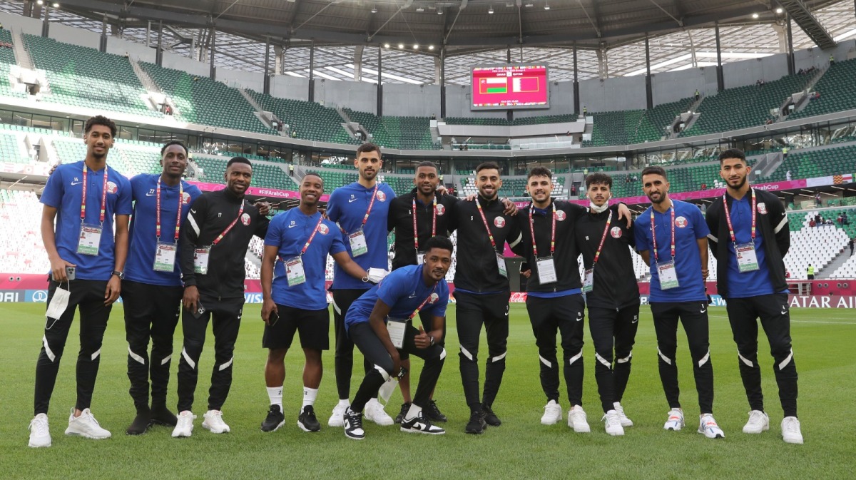 Qatar players pose for a photo. 