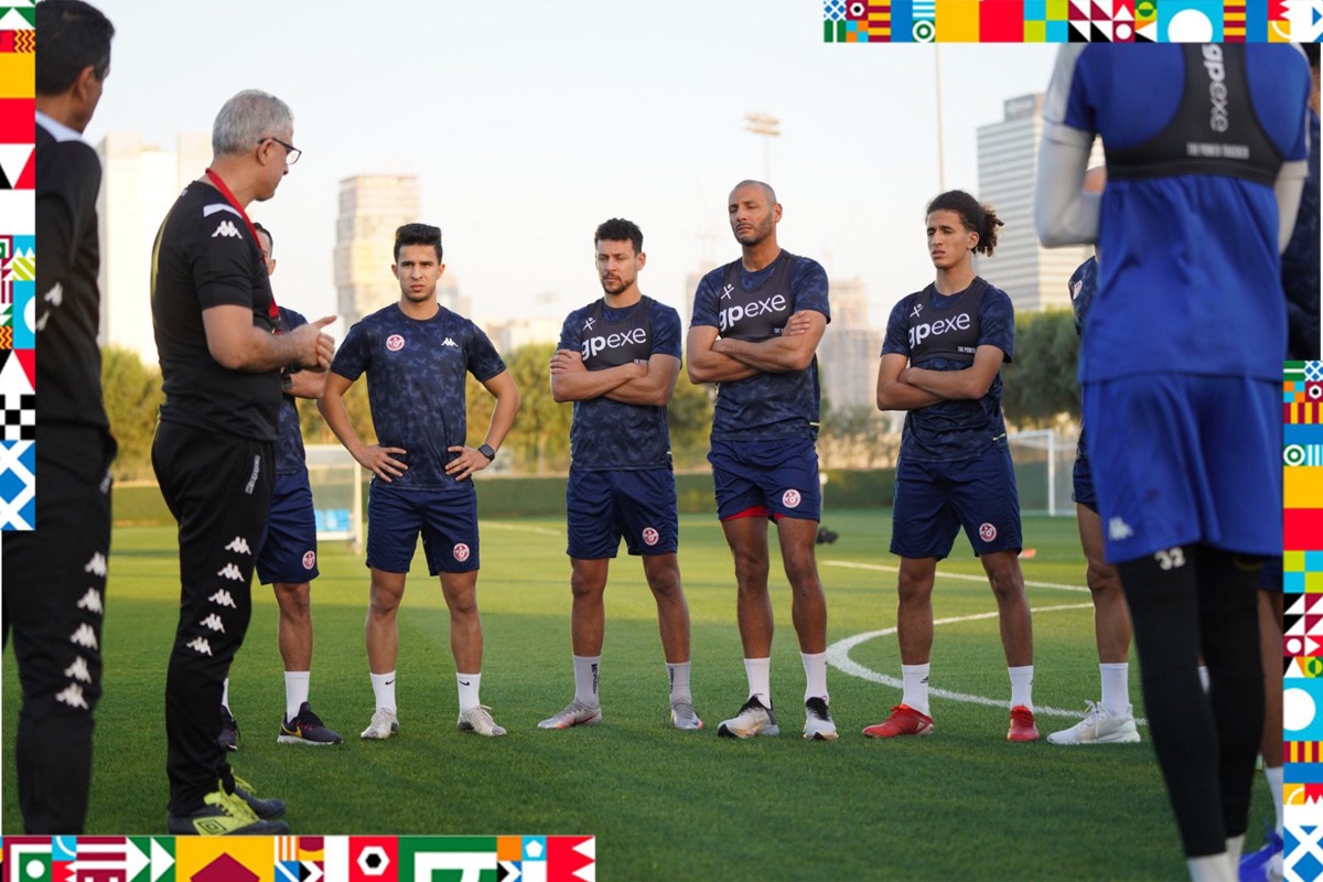 Tunisia's coach Mondher El Kabir speaks to his players during a training session in Doha. Pic: Twitter/@FTF_OFFICIELLE