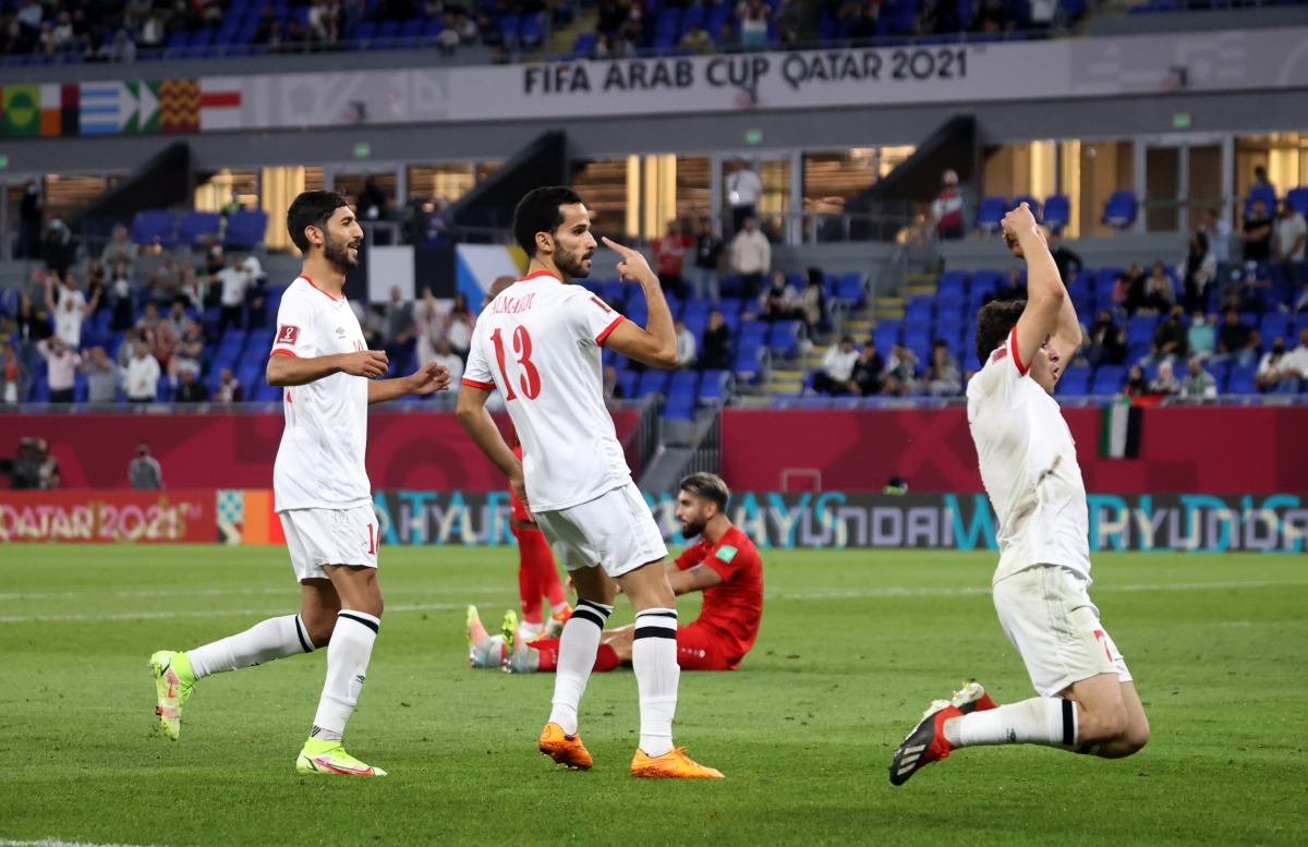 Jordan’s Mahmoud Al Mardi celebrates after scoring their third goal.