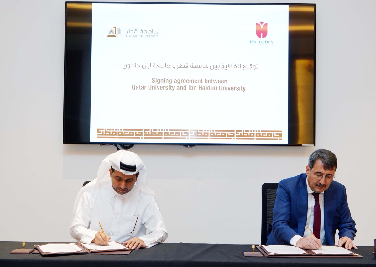 Qatar University President Dr. Hassan Al Derham and IHU President Dr. Atilla Arkan signing the agreement.