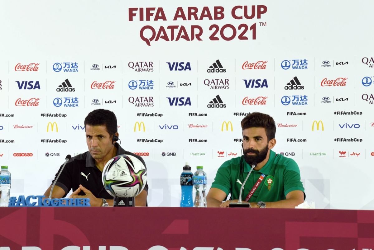 Morocco coach Hussein Ammouta speaks during a press conference. 