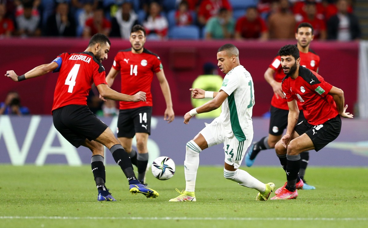 Algeria’s Sofiane Bendebka in action with Egypt’s Amr El Soulia during their Group D match at Al Janoub Stadium on December 7.