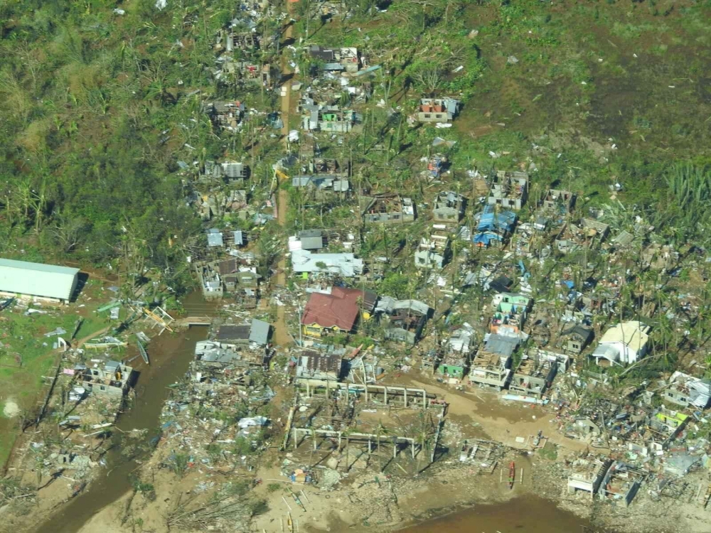 Aerial view showing damaged houses in Surigao City, Surigao Del Norte Province, Philippines, December 17, 2021. Picture taken December 17, 2021. Philippine Coast Guard/Handout via REUTERS. 