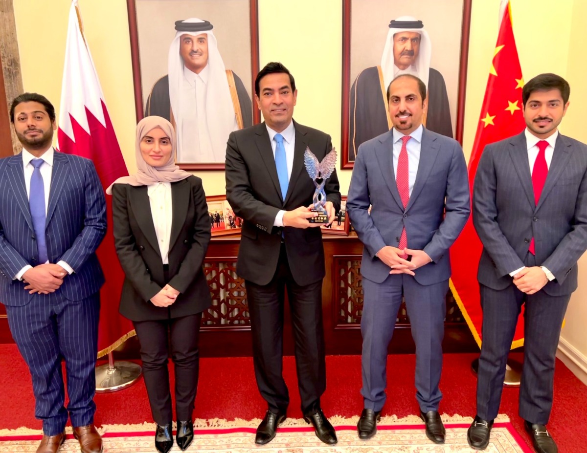 Ambassador of Qatar to China, Mohammed bin Abdullah Al Duhaimi, with embassy officials in Beiing.