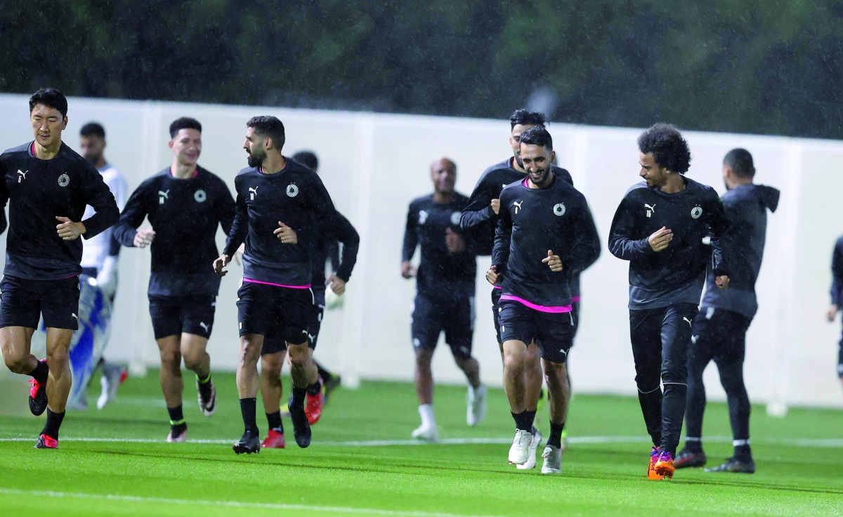 Al Sadd players during a training session, yesterday.