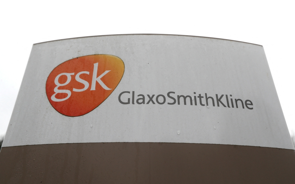 A GlaxoSmithKline (GSK) logo is seen at the GSK research centre in Stevenage, Britain November 26, 2019. REUTERS/Peter Nicholls/File Photo