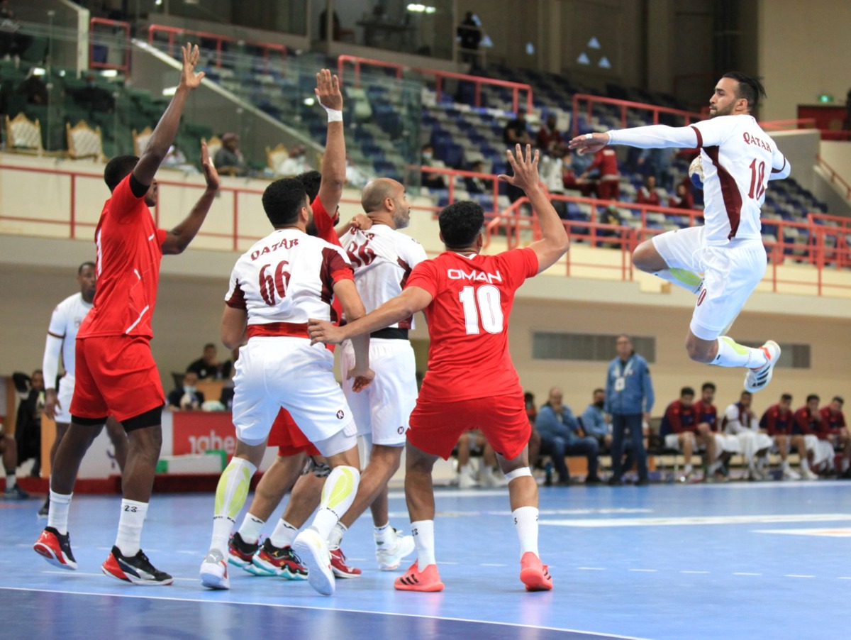 A Qatari player prepares to shoot at the goal during the Asian Men’s Handball Championship Group C match against Oman, yesterday. 