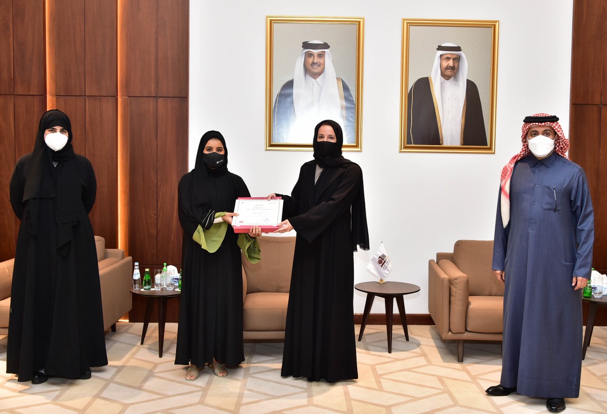 Minister of Education and Higher Education H E Buthaina bint Ali Al Jabr Al Nuaimi and President of Qatar University Dr. Hassan bin Rashid Al Derham honouring students at the conclusion of the ceremony. 