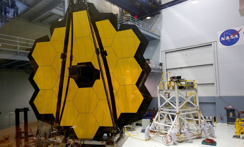 The James Webb Space Telescope Mirror is seen during a media unveiling at NASA’s Goddard Space Flight Center at Greenbelt, Maryland November 2, 2016. REUTERS/Kevin Lamarque/File Photo