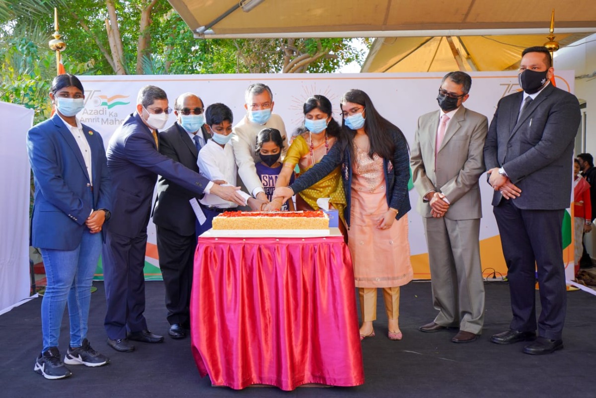 Ambassador Dr. Deepak Mittal and others cut a cake to mark the Republic Day of India at Indian Embassy in Doha, yesterday.