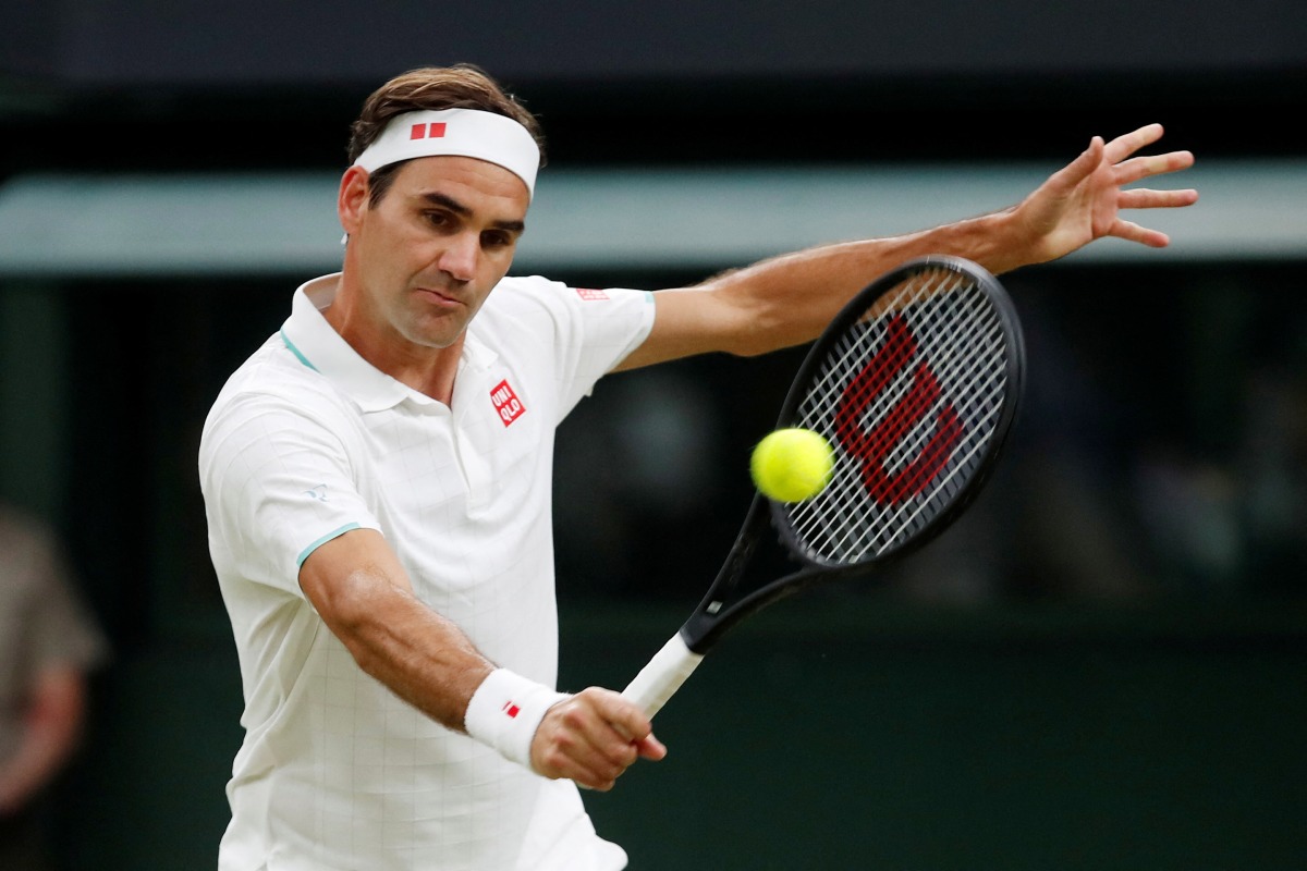 FILE PHOTO: Tennis - Wimbledon - All England Lawn Tennis and Croquet Club, London, Britain - July 5, 2021 Switzerland's Roger Federer in action. REUTERS/Paul Childs/File Photo
