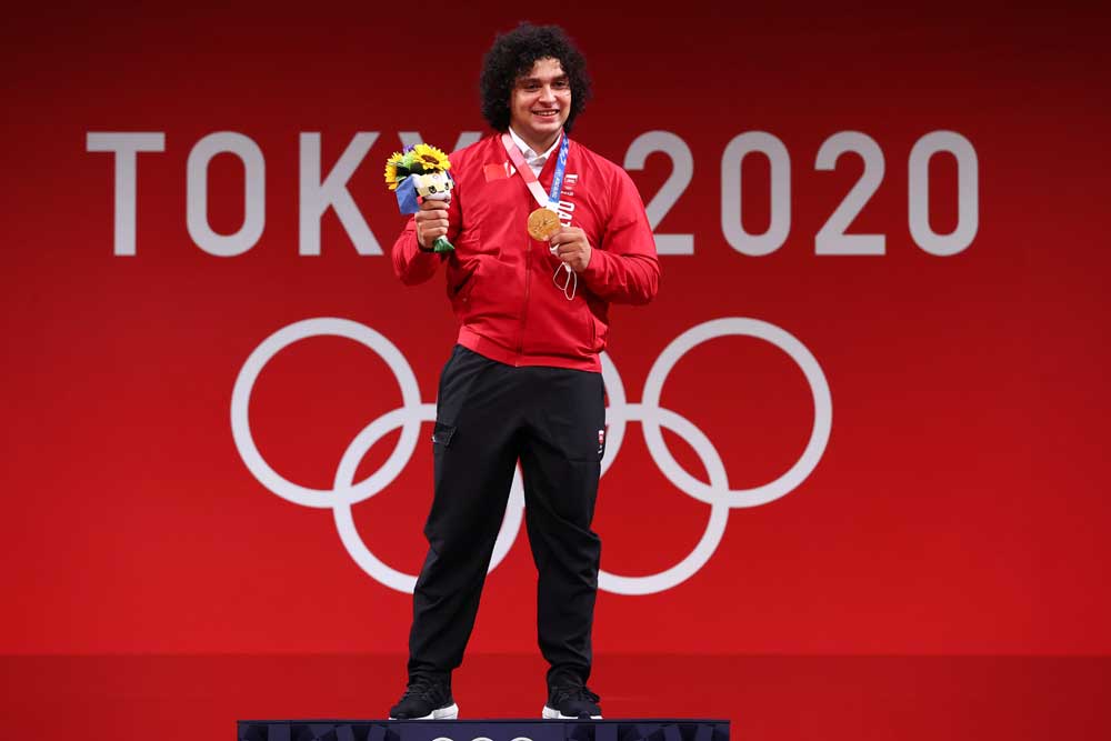 Fares Ibrahim celebrates on the podium after winning Qatar's first Olympic gold medal at the Tokyo  Games in this July 31, 2021 file photo.