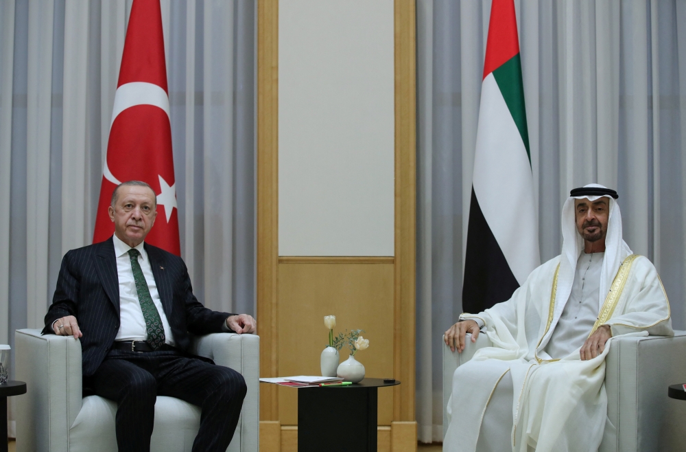 Turkish President Tayyip Erdogan meets with Abu Dhabi's Crown Prince Sheikh Mohammed bin Zayed al-Nahyan in Abu Dhabi, United Arab Emirates February 14, 2022. Presidential Press Office/Handout via Reuters