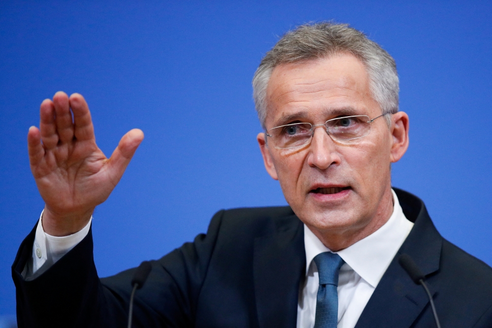 NATO Secretary-General Jens Stoltenberg speaks during a news conference following a NATO Defence Ministers meeting in Brussels, Belgium, February 17, 2022. REUTERS.