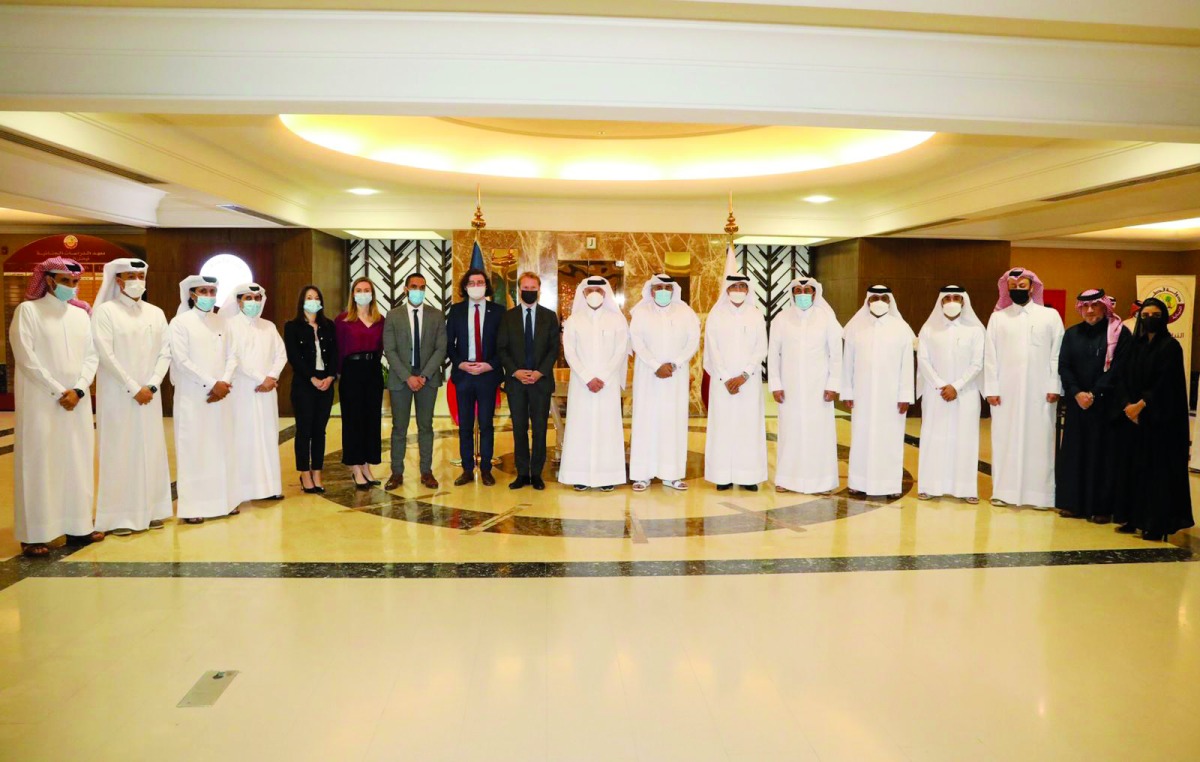 Attorney-General H E Dr. Issa bin Saad Al Jafali Al Nuaimi, Ambassador of France to Qatar  Jean-Baptiste Faivre and French judges participating in the training course, along with other officials during the ceremony.