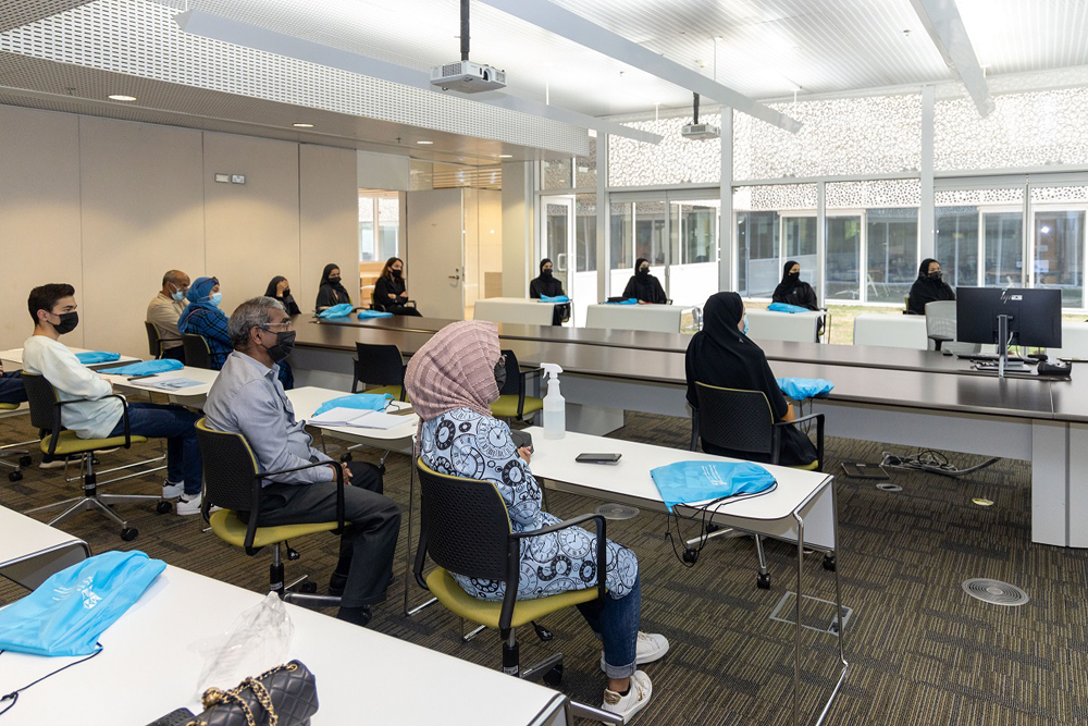 Participants during an information session on the campus.