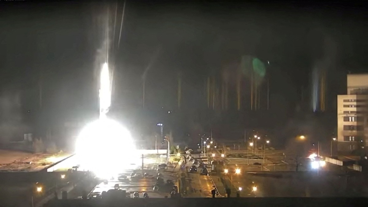 Surveillance camera footage shows a flare landing at the Zaporizhzhia nuclear power plant during shelling in Enerhodar, Zaporizhia Oblast, Ukraine March 4, 2022, in this screengrab from a video obtained from social media. Zaporizhzhya NPP via YouTube/via REUTERS 