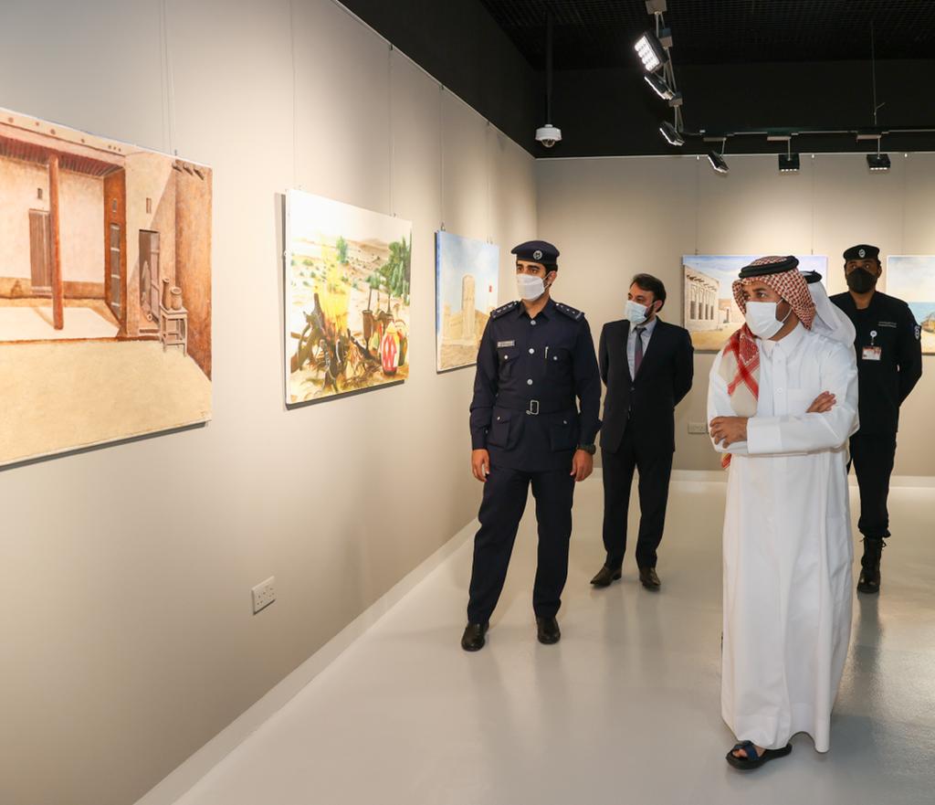 Officials at the launch of an exhibition of artworks created by inmates. 