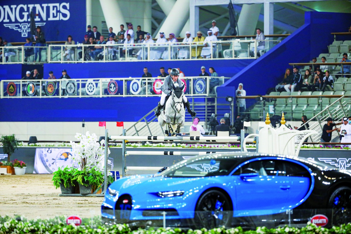 German rider Ludger Beerbaum guides Mila over a fence during the Longines Global Champions Tour Grand Prix of Doha, yesterday.