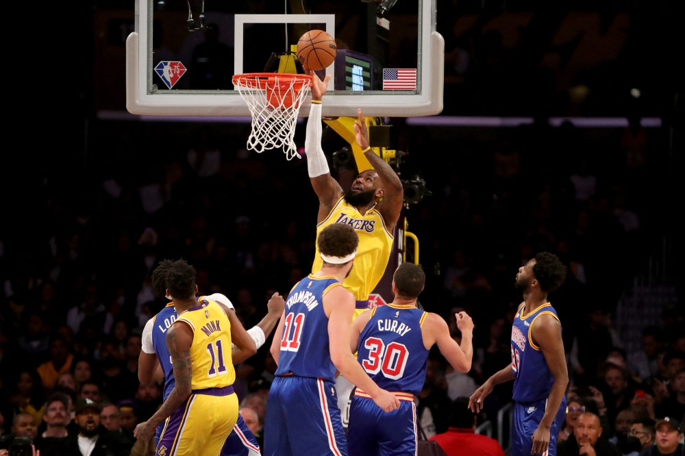 Los Angeles Lakers forward LeBron James (6) goes to the basket against Golden State Warriors during the first quarter at Crypto.com Arena. Mandatory Credit: Kiyoshi Mio-USA TODAY Sports