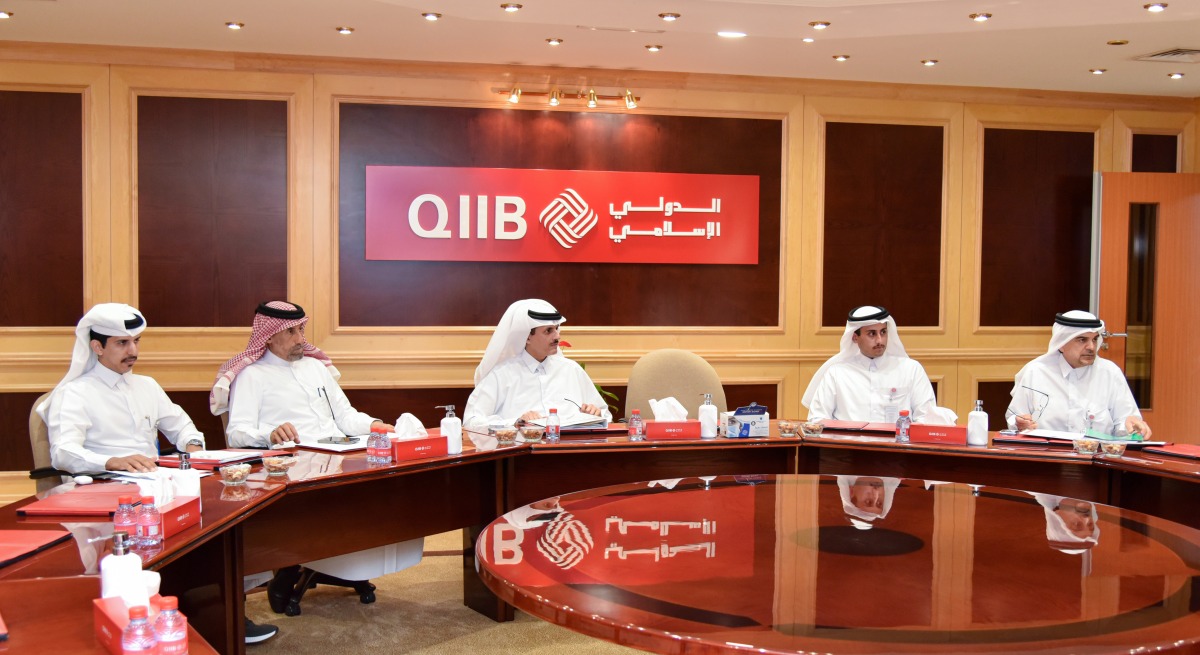 Chairman of QIIB’s Board of Directors, Sheikh Dr. Khalid bin Thani bin Abdullah Al Thani; Chief Executive Officer, QIIB, Dr. Abdulbasit Ahmed Al Shaibei and other officials during the QIIB's Annual General Assembly held, yesterday.  