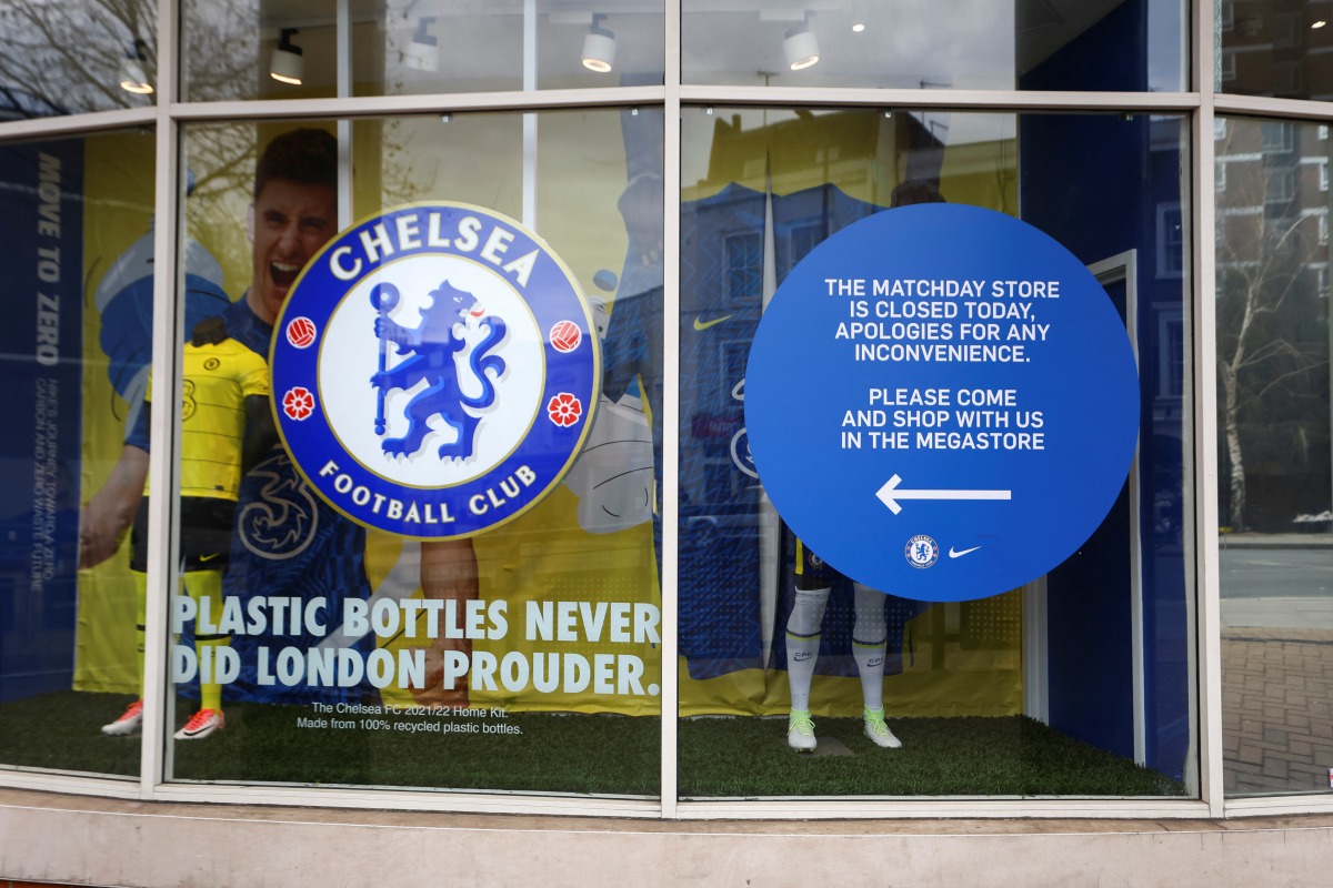 A shop selling the merchandise of Chelsea Football Club is seen closed after Britain imposed sanctions on its Russian owner, Roman Abramovich, in London, Britain, March 10, 2022. REUTERS/Hannah Mckay
