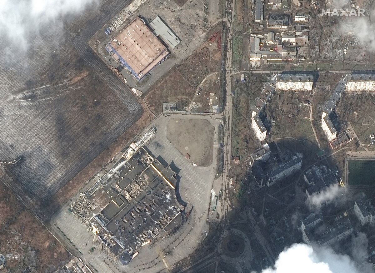 A satellite image shows heavily damaged shopping mall and other stores, amid Russia's ongoing invasion of Ukraine, in Mariupol, Ukraine, March 9, 2022. Satellite image ©2022 Maxar Technologies/Handout via REUTERS