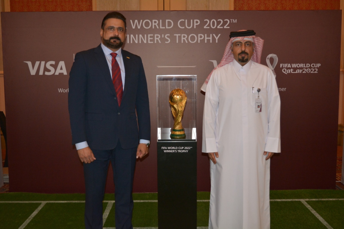 Officials of QNB and Visa with FIFA World Cup Winner’s Trophy during the event.